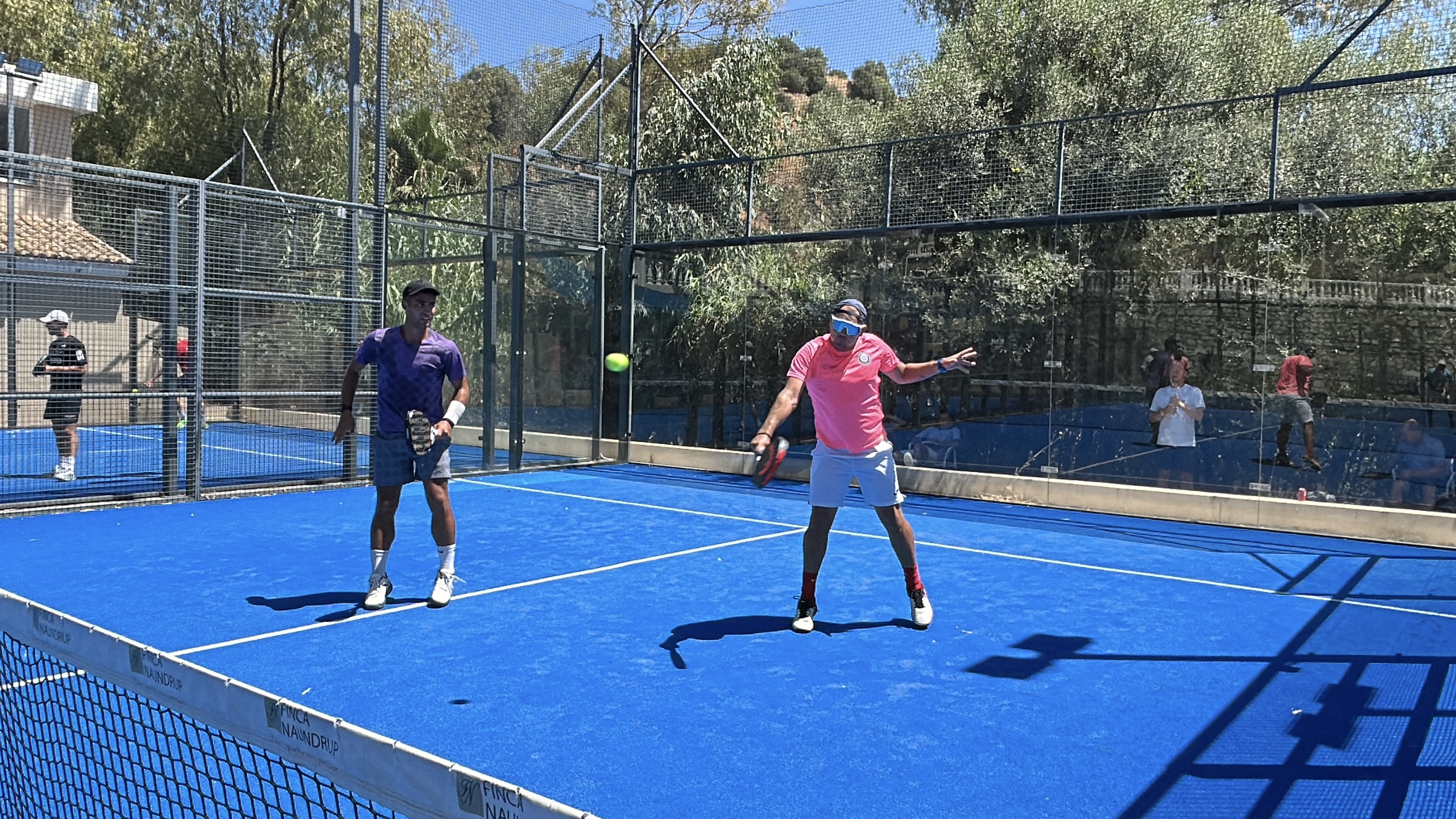 padel-players-on-blue-court-hypesport-padel-tour